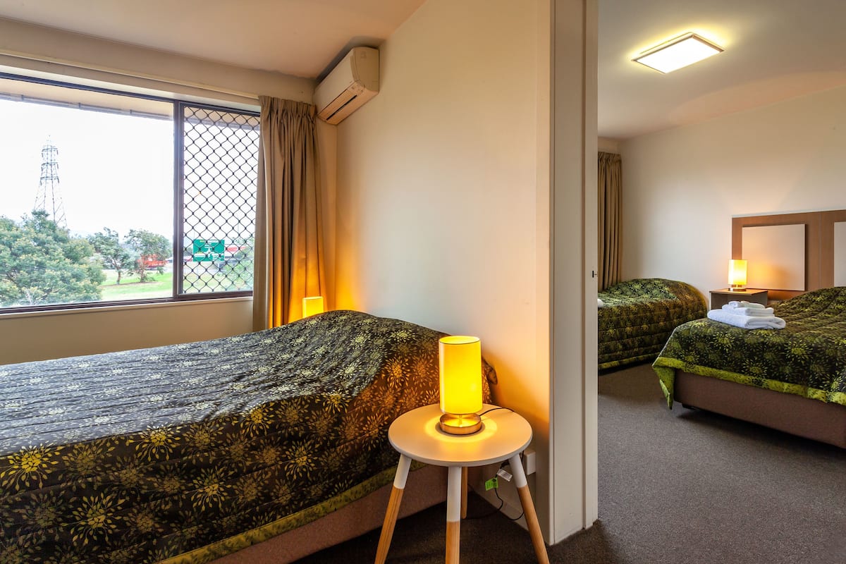 Family Room, 2 Bedrooms | Iron/ironing board (on request), bed sheets