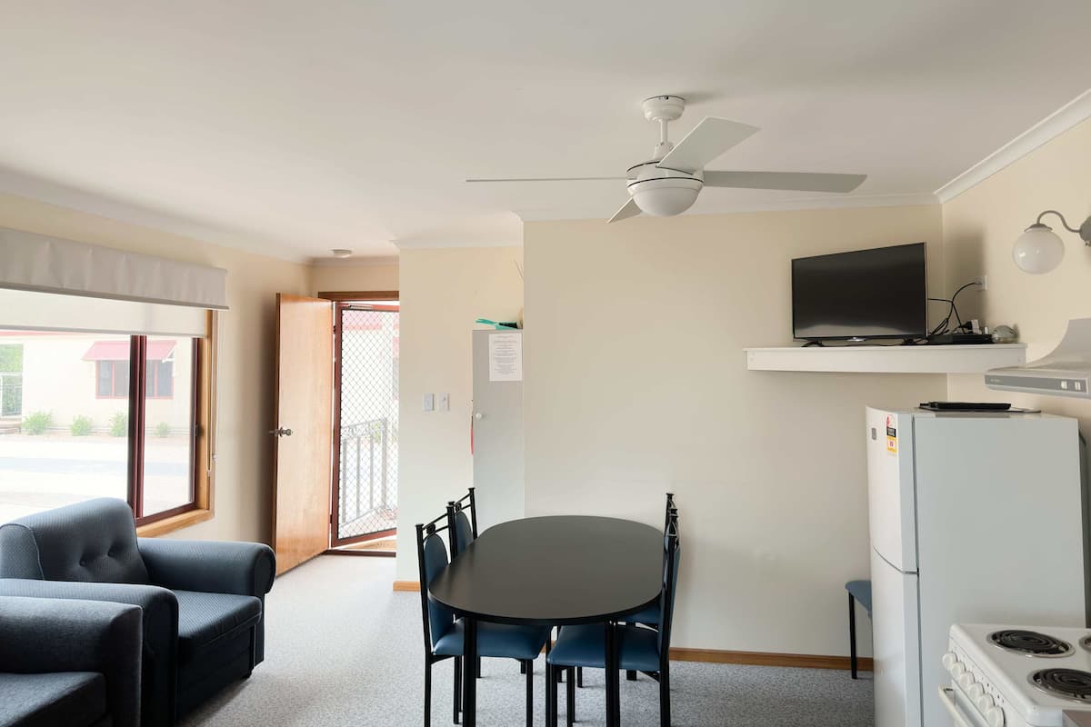 Flat-screen TV, DVD player, ping pong