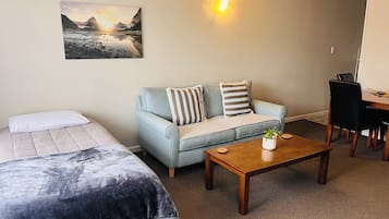 Standard Suite, 1 Bedroom, Non Smoking, Kitchen (Apartment) | Living area | 42-inch Smart TV with satellite channels, heated floors