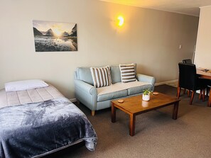 Standard Suite, 1 Bedroom, Non Smoking, Kitchen (Apartment) | Living area | 42-inch Smart TV with satellite channels, heated floors