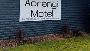 A motel sign with the name 'Aorangi Motel' and contact information. - Aorangi Motel (Fairlie)