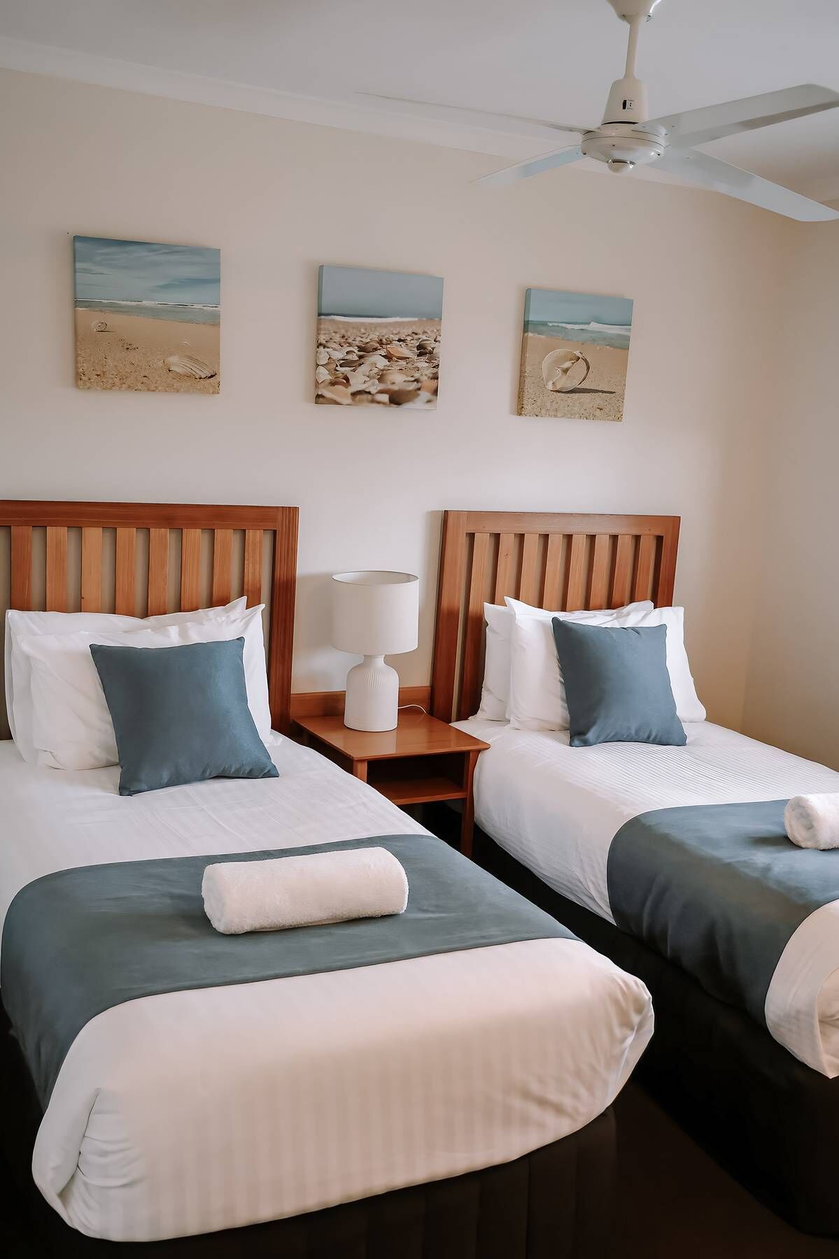 Premium bedding, pillowtop beds, laptop workspace, blackout drapes