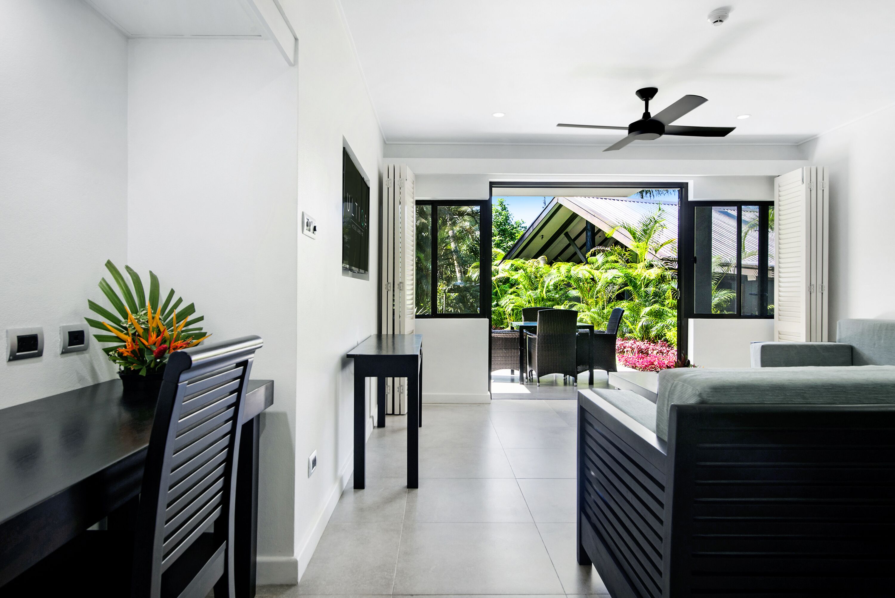 two bedroom standard apartment | living area | 47-inch tv with cable channels, dvd player