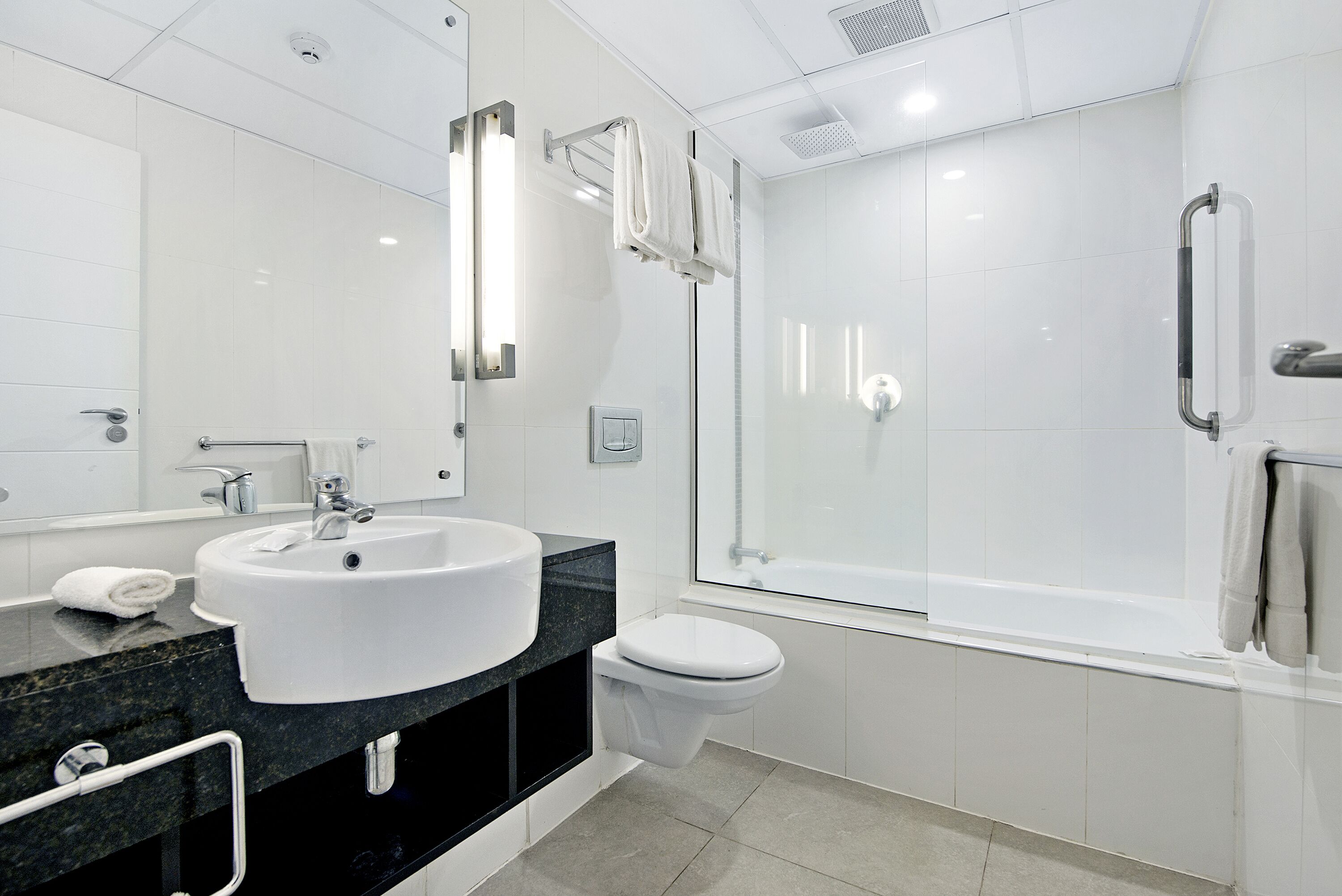 two bedroom standard apartment | bathroom | separate bathtub and shower, rainfall showerhead, free toiletries
