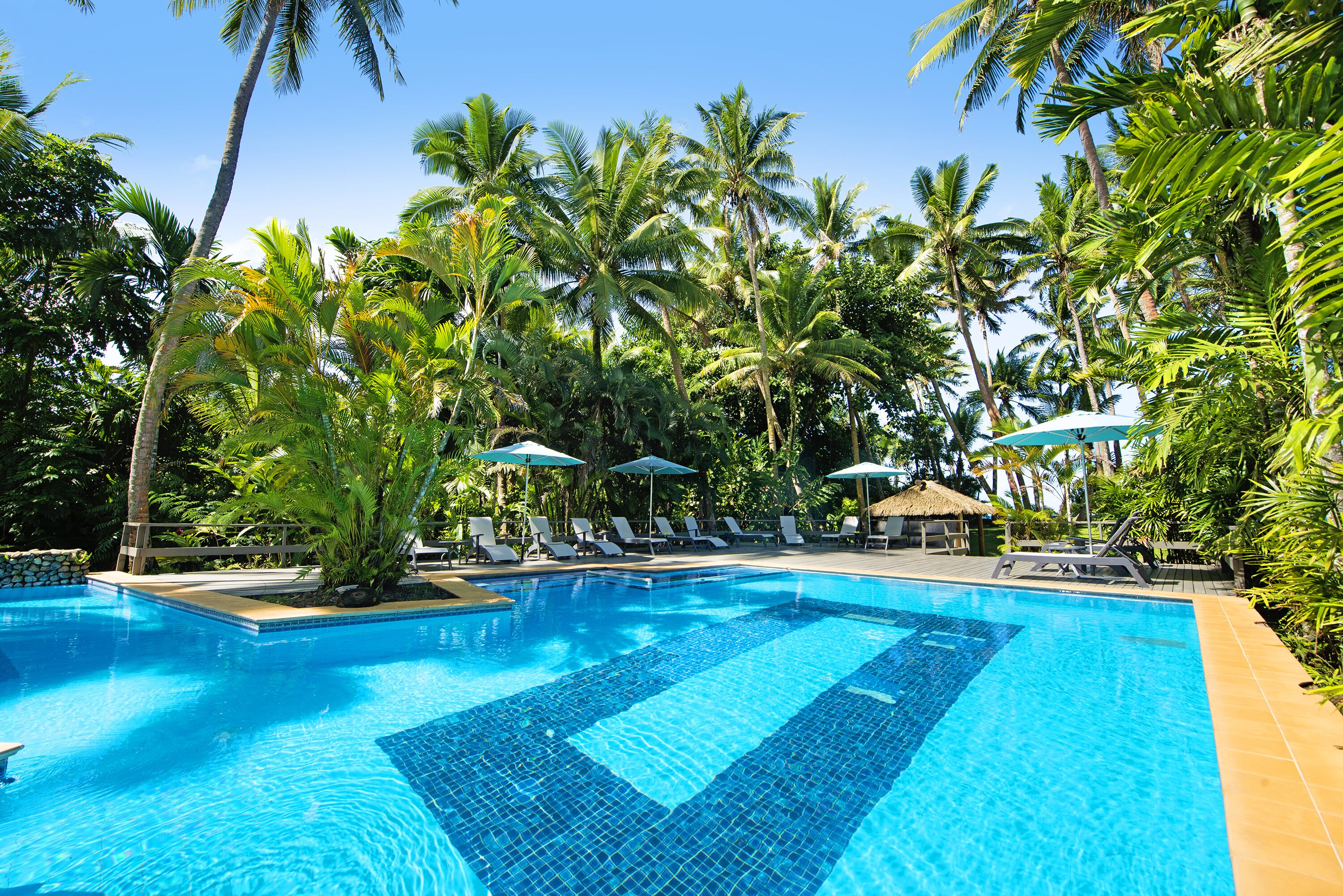 outdoor pool, pool umbrellas, pool loungers