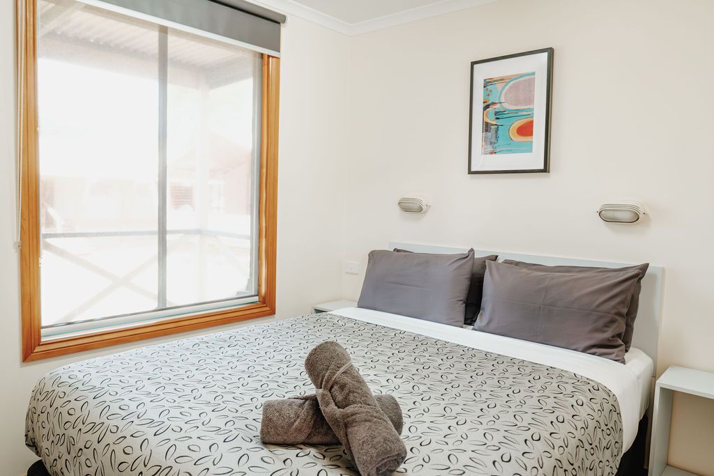 1 bedroom, blackout curtains, iron/ironing board, bed sheets