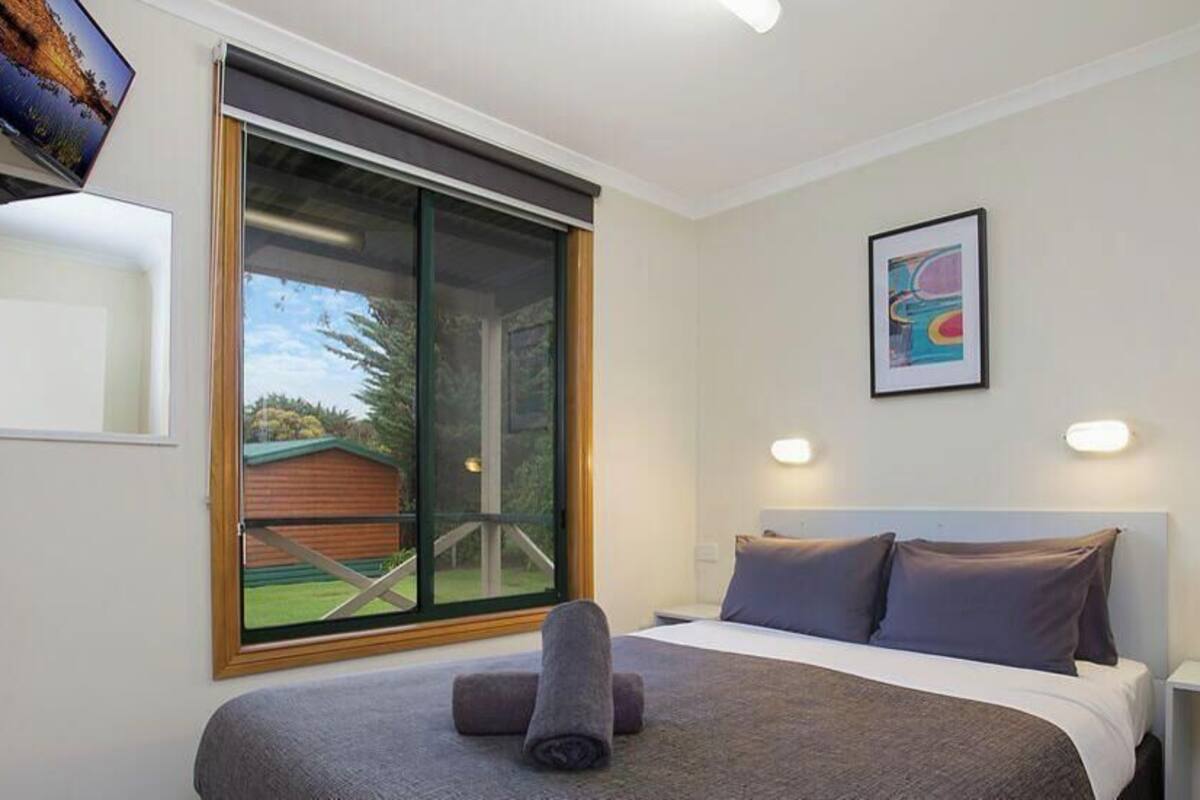 1 bedroom, blackout curtains, iron/ironing board, bed sheets