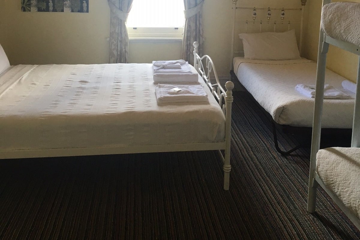 Family Room, Shared Bathroom | 1 bedroom, individually decorated, individually furnished