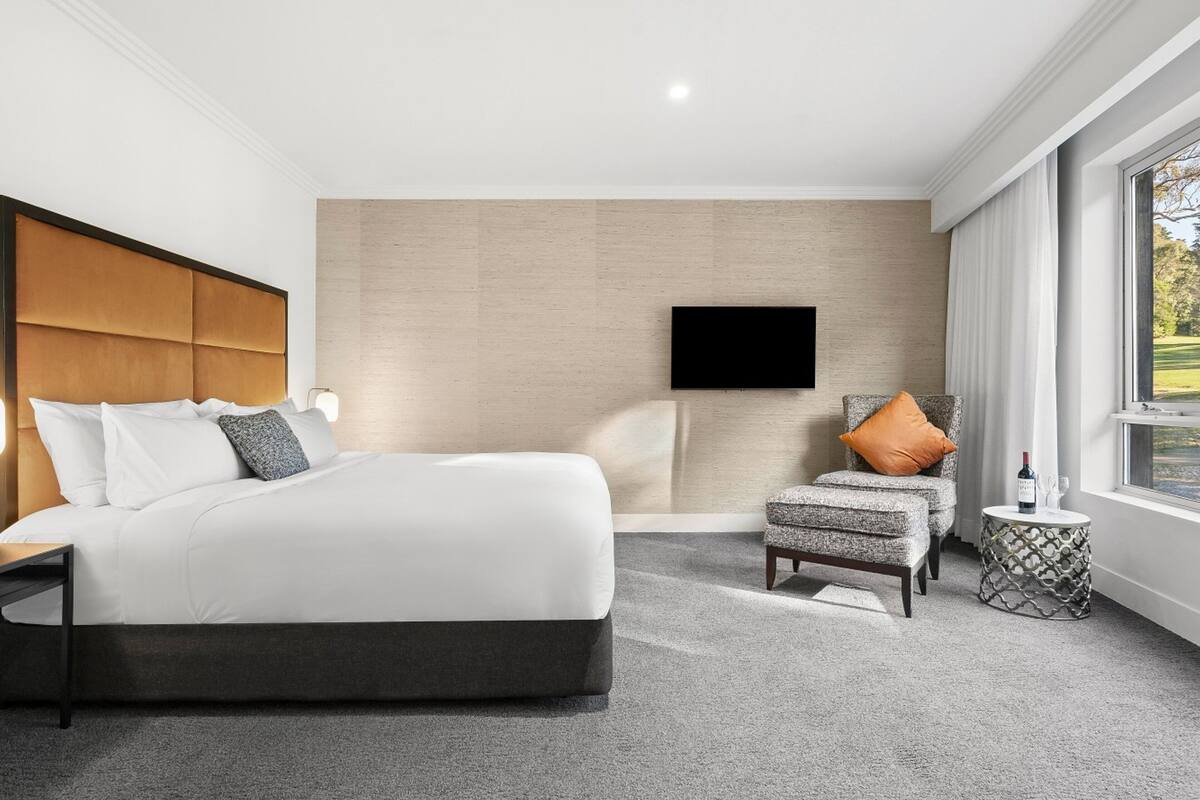 ambassador suite | premium bedding, desk, iron/ironing board, cots/infant beds