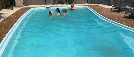 Outdoor pool, open 8:00 AM to 8:00 PM, pool umbrellas, pool loungers