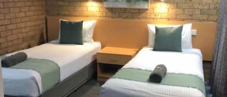 Standard Twin Room | Minibar, blackout drapes, iron/ironing board, free WiFi