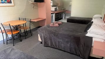 Premium bedding, pillowtop beds, laptop workspace, soundproofing