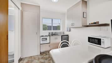 Twin Room | Private kitchen | Mini-fridge, microwave, electric kettle, toaster