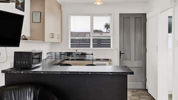 1 Bedroom Studio | Private kitchen | Mini-fridge, microwave, electric kettle, toaster