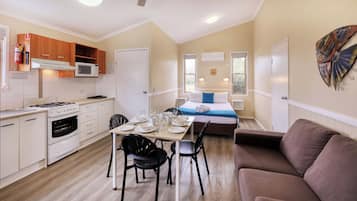 Queen Duplex Cabin | Private kitchen | Full-size fridge, microwave, stovetop, coffee/tea maker