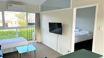 Suíte executiva, 1 quarto, para não fumantes, cozinha (corporate unit) | Área de estar