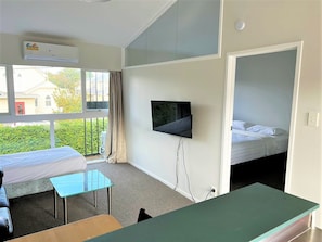 Executive Suite, 1 Bedroom, Non Smoking, Kitchen (corporate unit) | Living area - Ranfurly Evergreen Motel (Auckland)