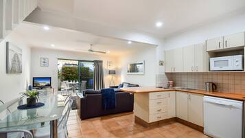 2 Bedroom Superior | Private kitchen | Full-sized fridge, microwave, oven, stovetop