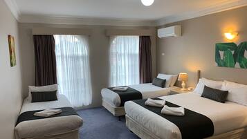 Family Room | Down duvets, desk, blackout curtains, iron/ironing board