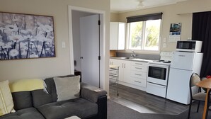Suite Standard, plusieurs chambres (Three Bedroom) | Aire de séjour