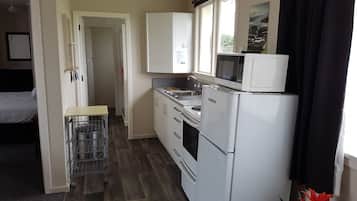 Three Bedroom Unit | Private kitchen | Fridge, microwave, coffee/tea maker, cookware/dishes/utensils