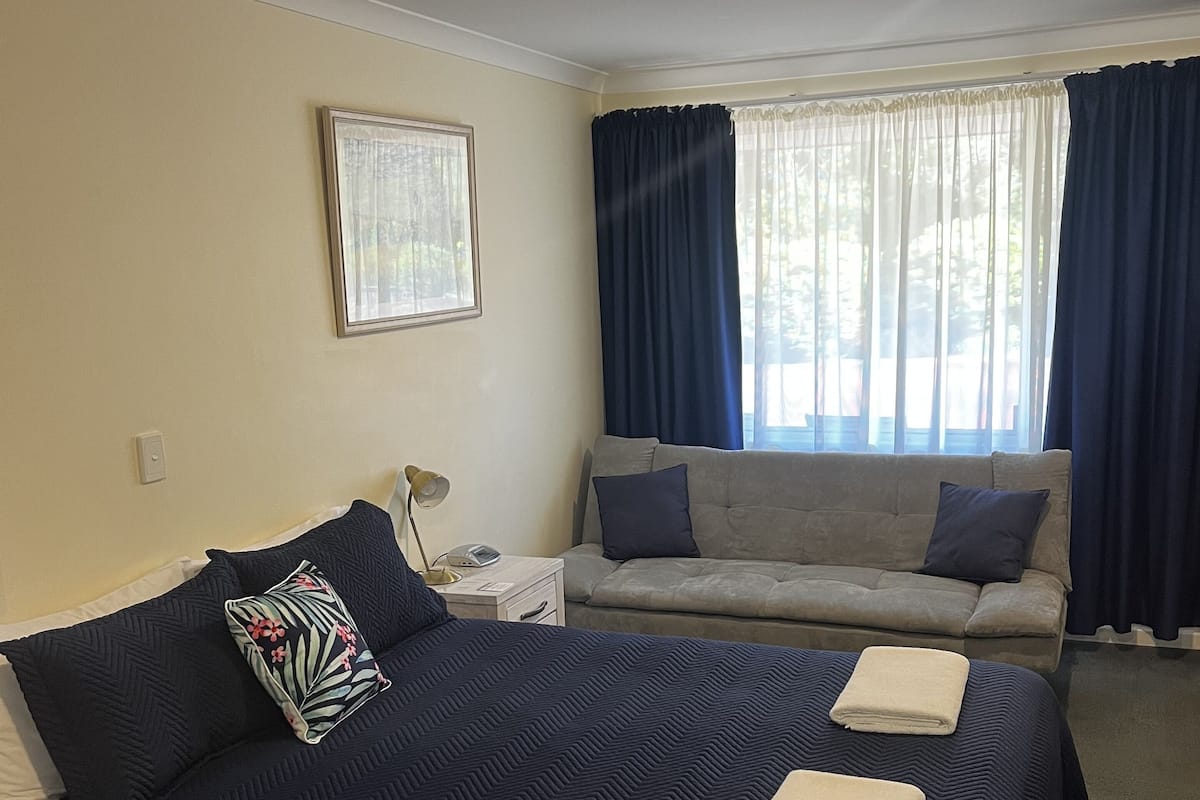 Premium bedding, blackout curtains, free WiFi, bed sheets