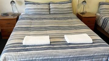 Premium bedding, blackout curtains, free WiFi, bed sheets