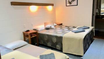 Family Twin Room, 1 Bedroom, Non Smoking, Private Bathroom | Individually furnished, desk, laptop workspace, blackout curtains