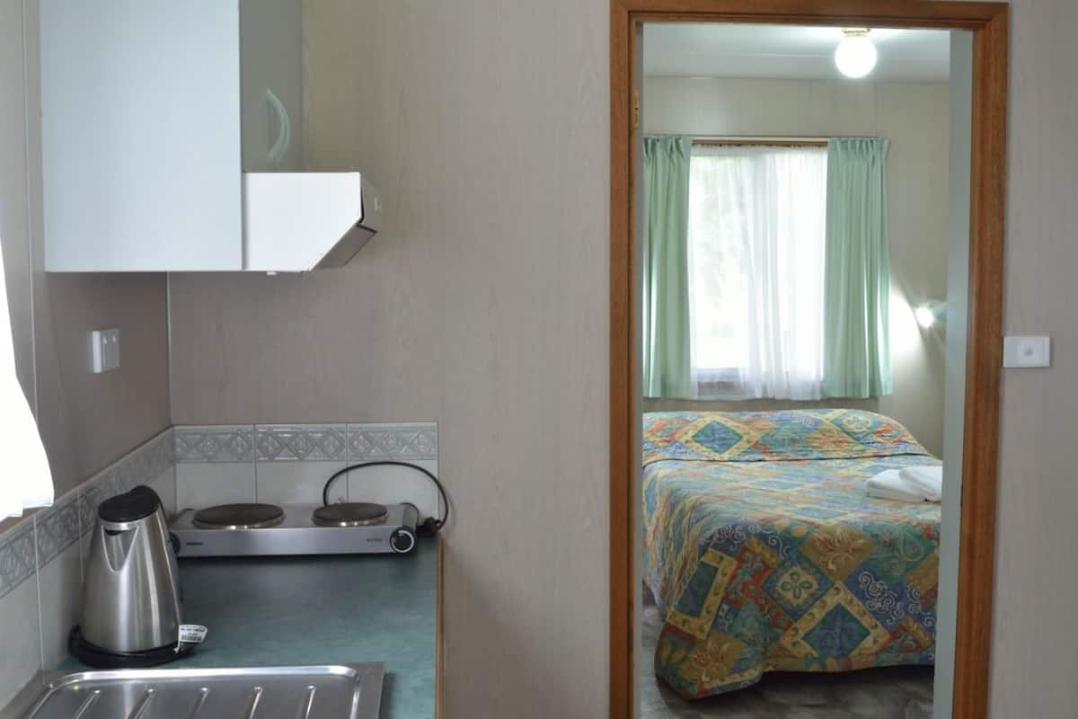 Klassiek huisje, niet-roken, kitchenette (Superior One Bedroom) | Beddengoed