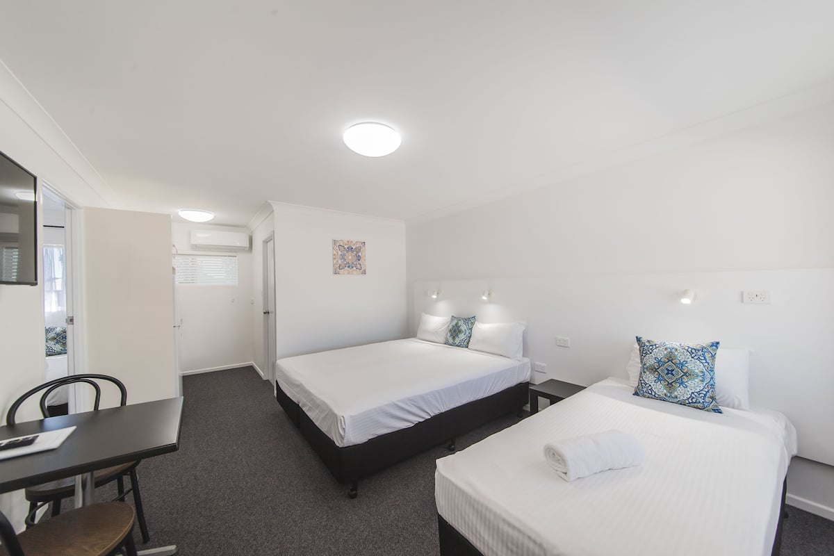 Classic Suite, 2 Bedrooms, Kitchenette | Living area | 43-cm Smart TV with digital channels, TV