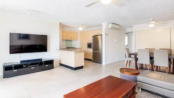 Standard Apartment, 2 Bedrooms | Living area | 50-inch flat-screen TV with digital channels, TV