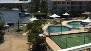 2 outdoor pools, open 7:00 AM to 9:00 PM, pool umbrellas, sun loungers - Pelican Cove (Biggera Waters)