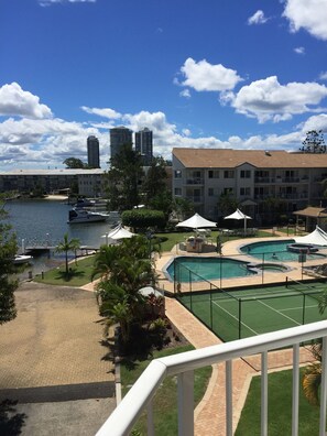 2 outdoor pools, open 7:00 AM to 9:00 PM, pool umbrellas, pool loungers - Pelican Cove (Biggera Waters)