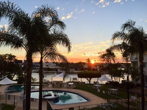 2 outdoor pools, open 7:00 AM to 9:00 PM, pool umbrellas, sun loungers - Pelican Cove (Biggera Waters)