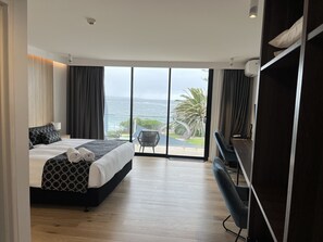 Deluxe Room - First Level Accessible | Living area | Flat-screen TV, Netflix - Ocean Front at The Entrance (The Entrance)