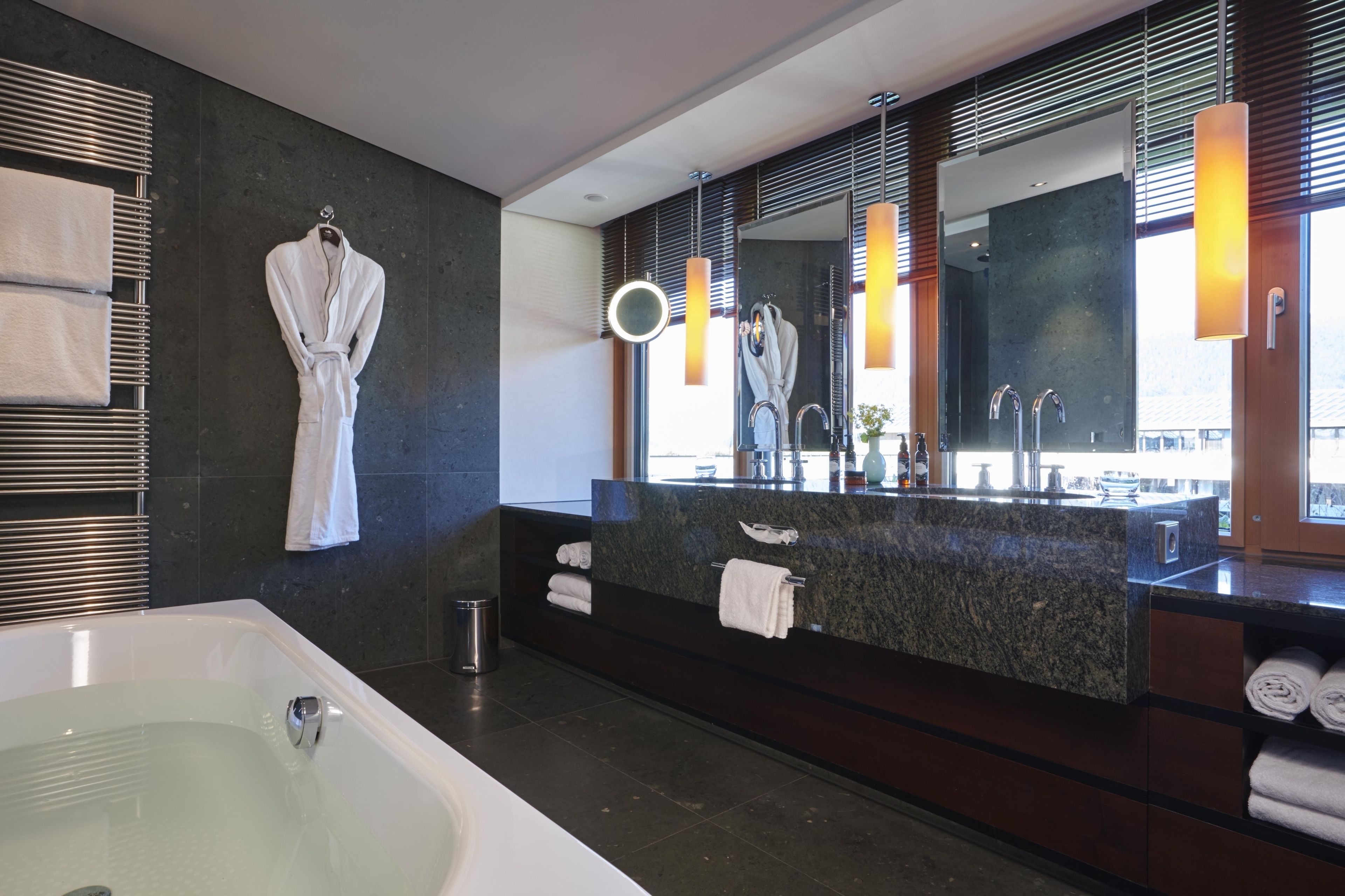 rainfall showerhead, eco-friendly toiletries, hair dryer, bathrobes