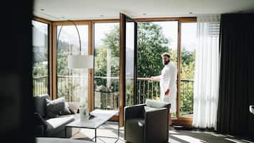 Chambre, vue montagne | Coin séjour