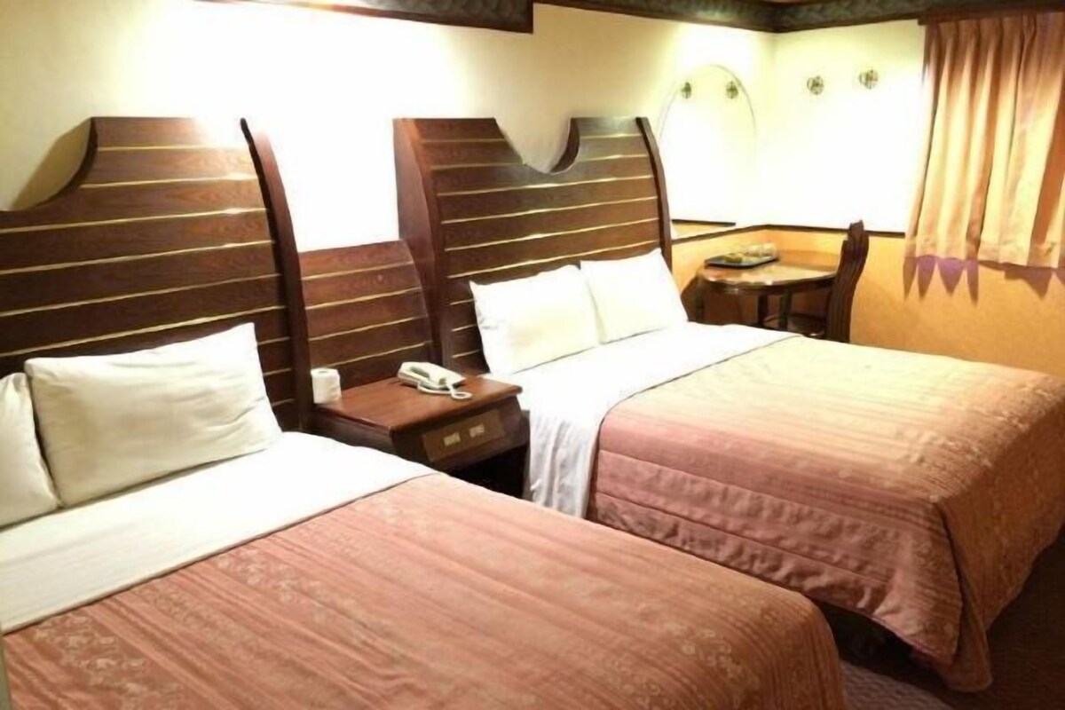 Blackout curtains, rollaway beds, free WiFi, bed sheets