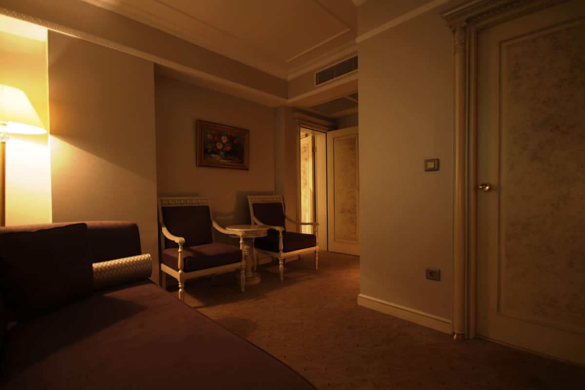 Family Room | 1 bedroom, premium bedding, minibar, in-room safe