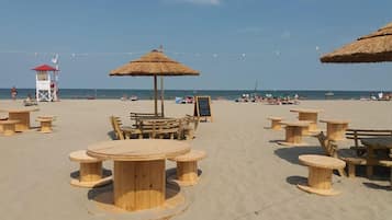 Beach nearby, white sand, sun-loungers, beach umbrellas