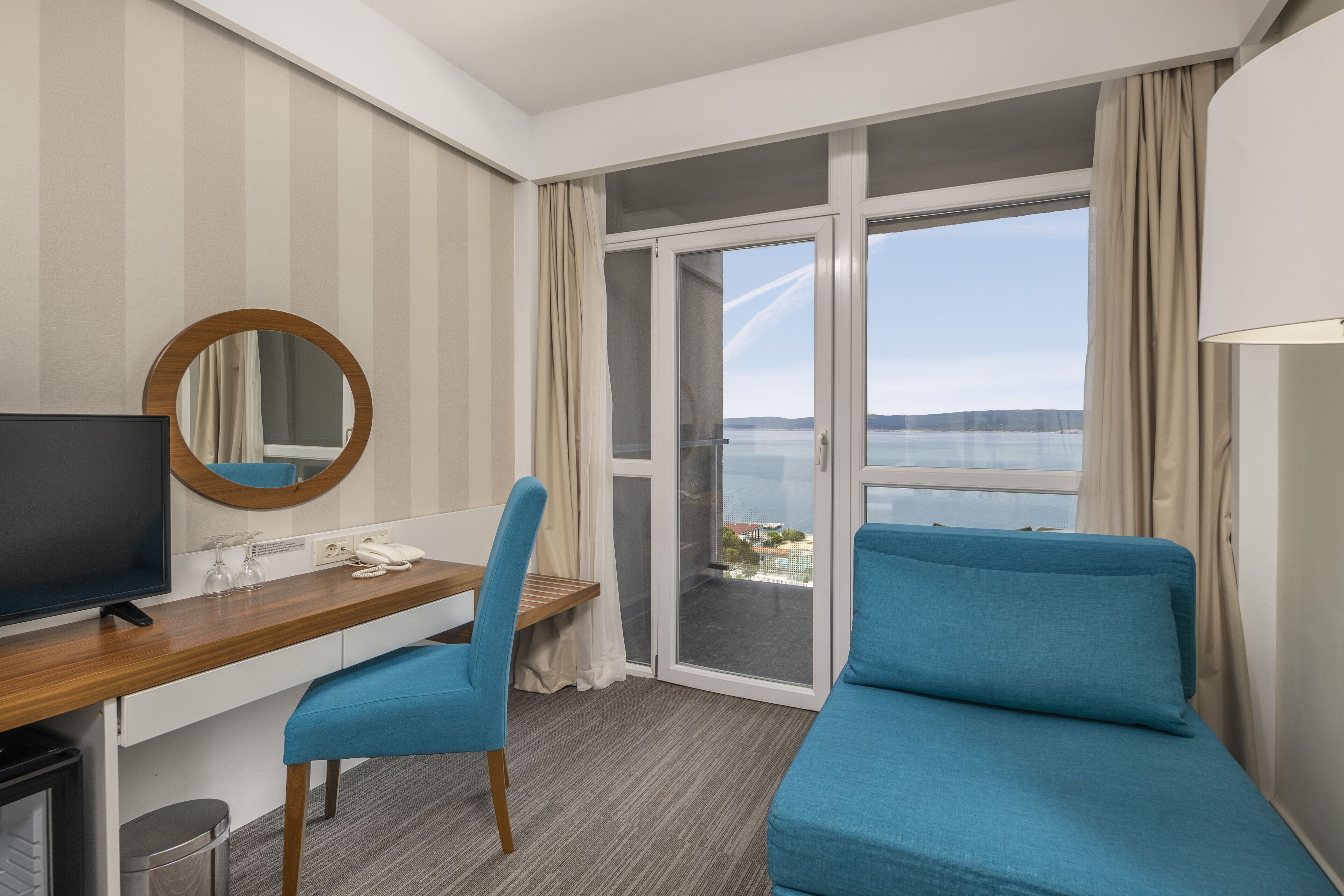 superior twin room, sea view, balcony | minibar, in-room safe, desk, laptop workspace