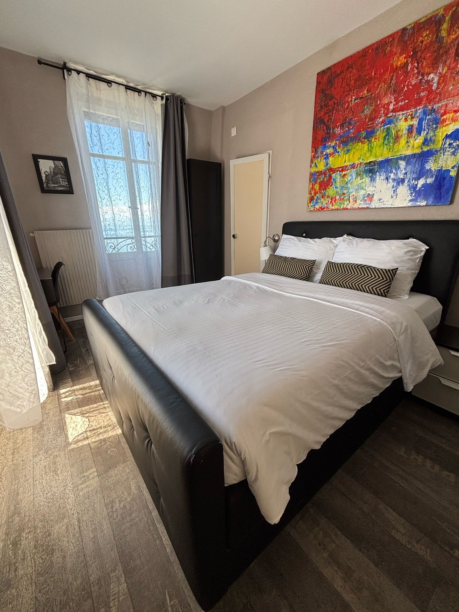 economy double room, 1 double bed, lake view | in-room safe, desk, iron/ironing board, free wifi