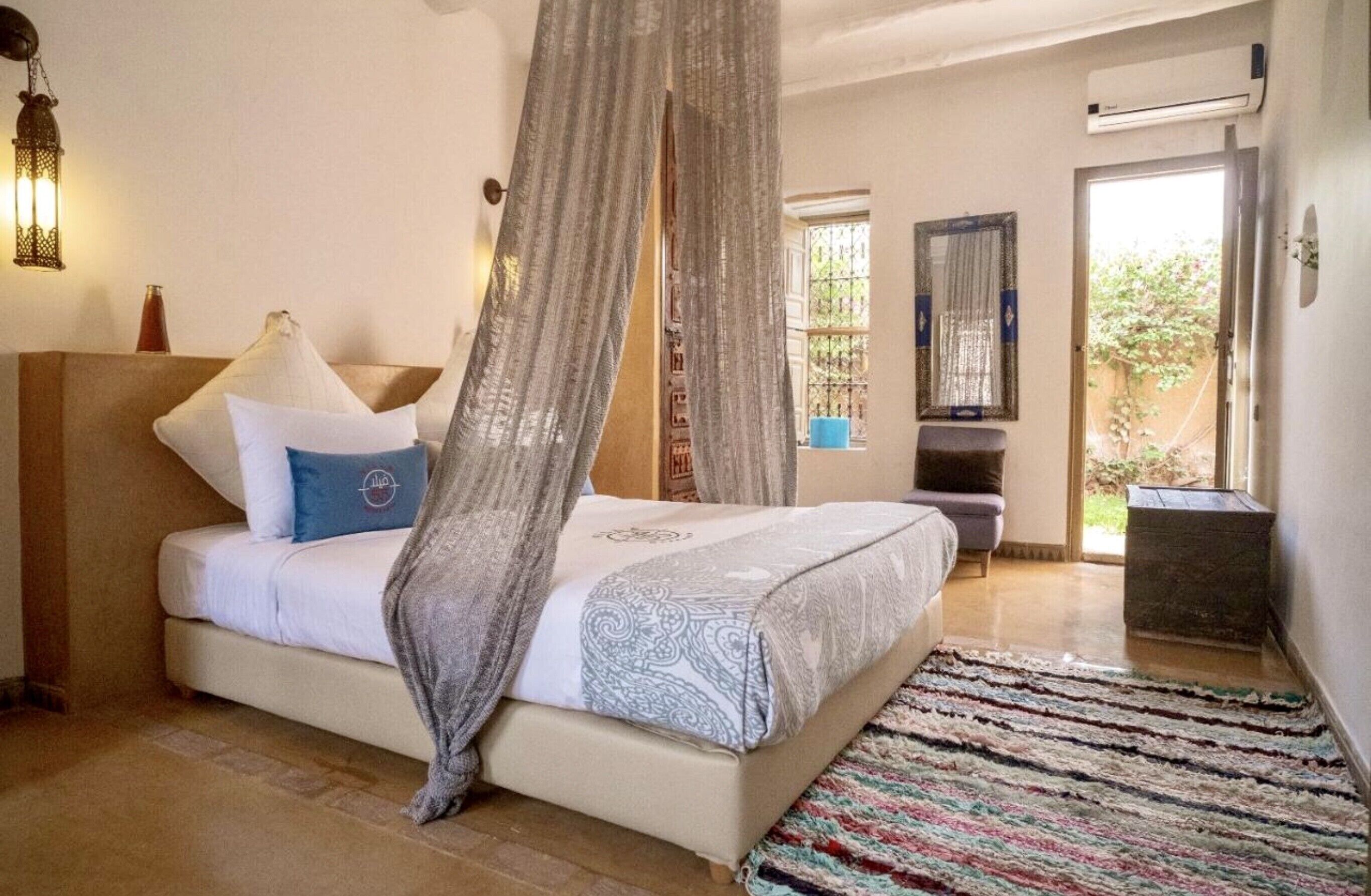 deluxe suite (blue) | bathroom | shower, designer toiletries, hair dryer, towels