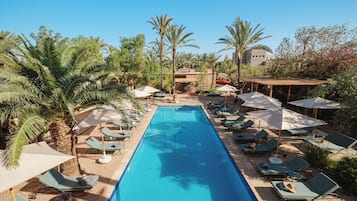 Outdoor pool, pool umbrellas, sun loungers