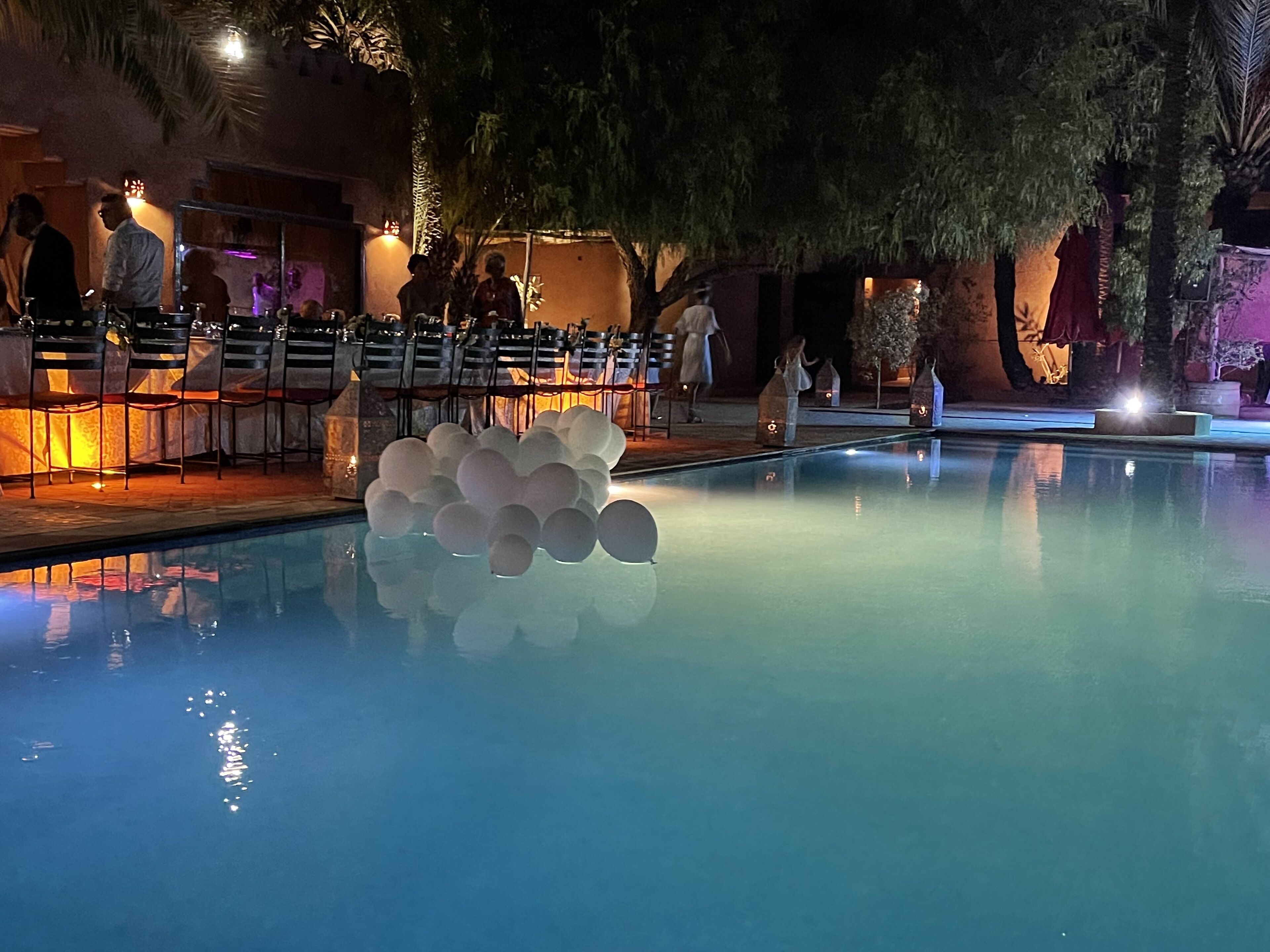 outdoor pool, pool umbrellas, pool loungers