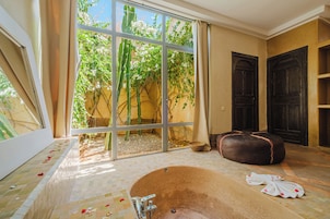 Suite Royale | Bathroom | Designer toiletries, hair dryer, soap, shampoo