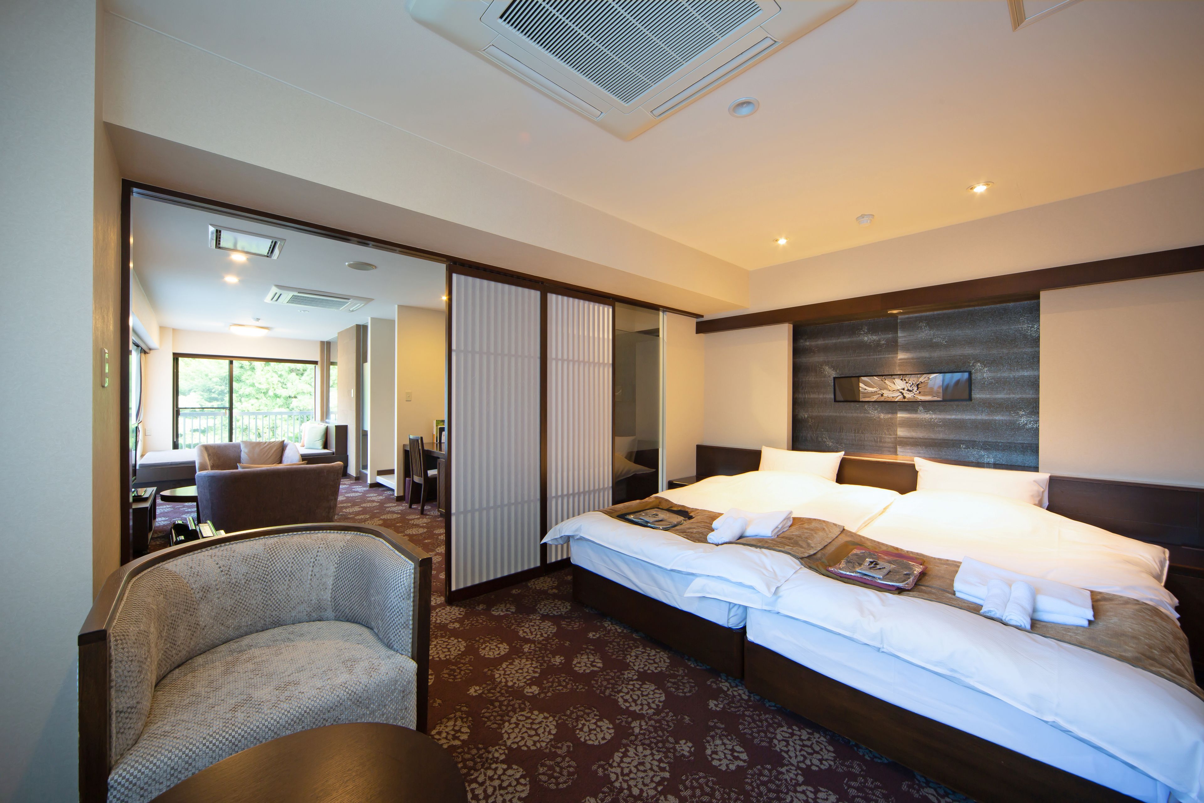 premium suite, non smoking | 1 bedroom, down duvets, in-room safe, desk