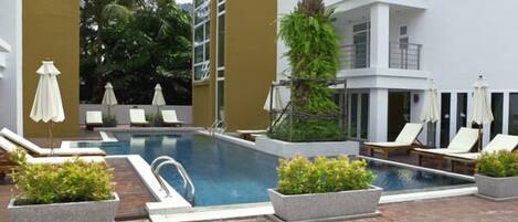 2 outdoor pools, pool umbrellas, sun loungers