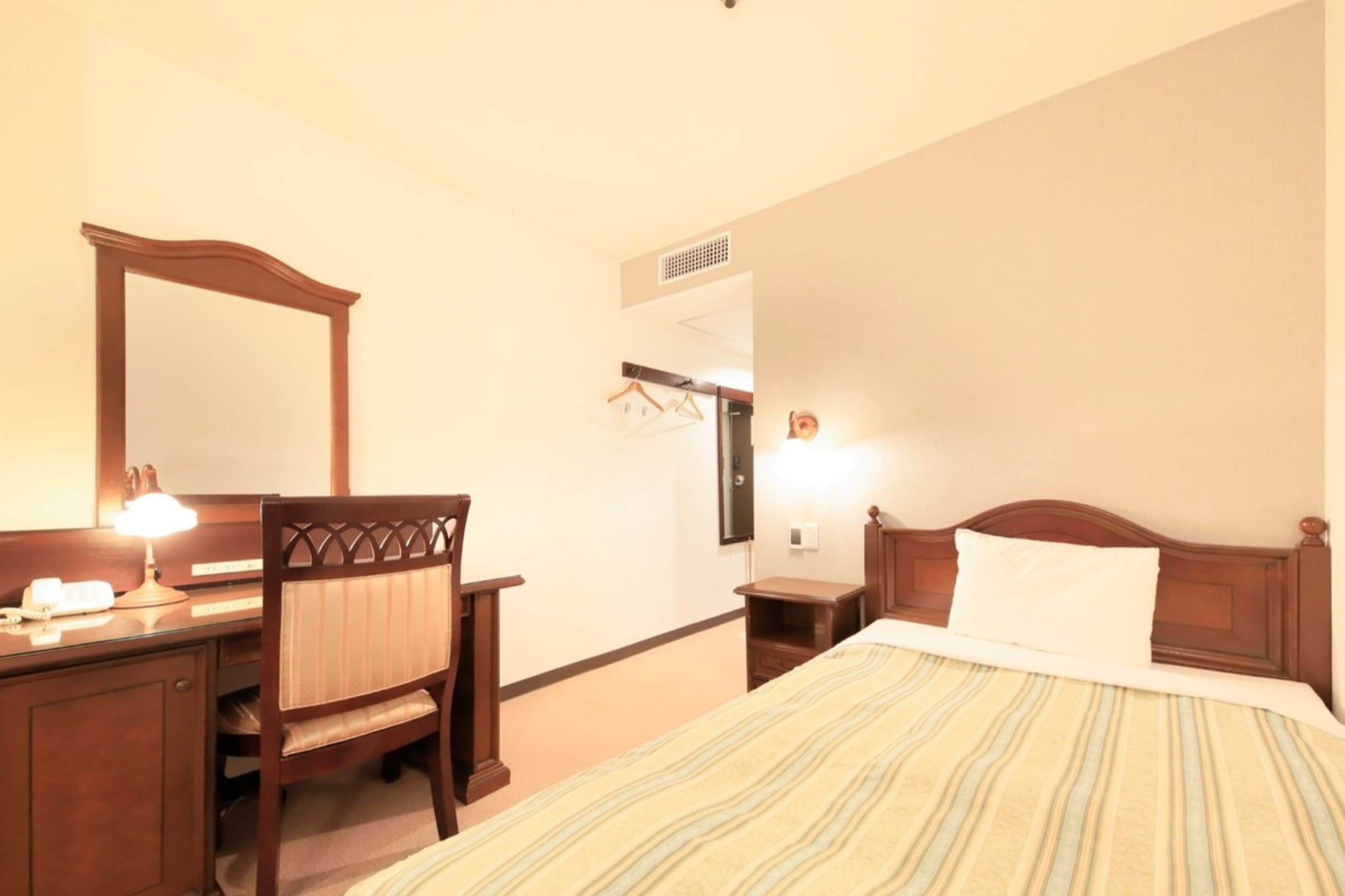 Desk, blackout curtains, iron/ironing board (on request), free WiFi