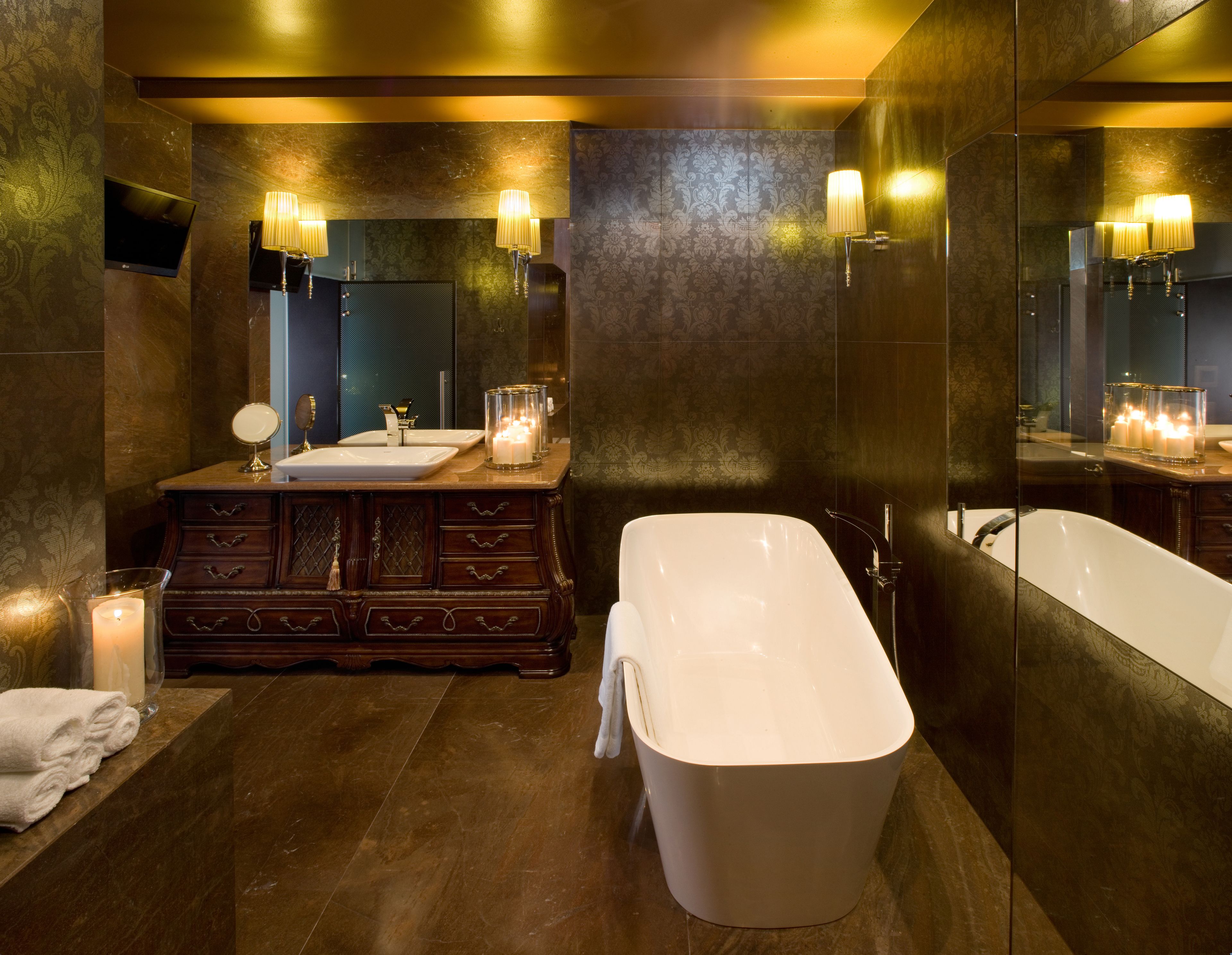 luxury apartment (royal) | bathroom | separate bathtub and shower, hair dryer, bathrobes, slippers